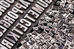 A close-up mix of vintage letterpress characters.
